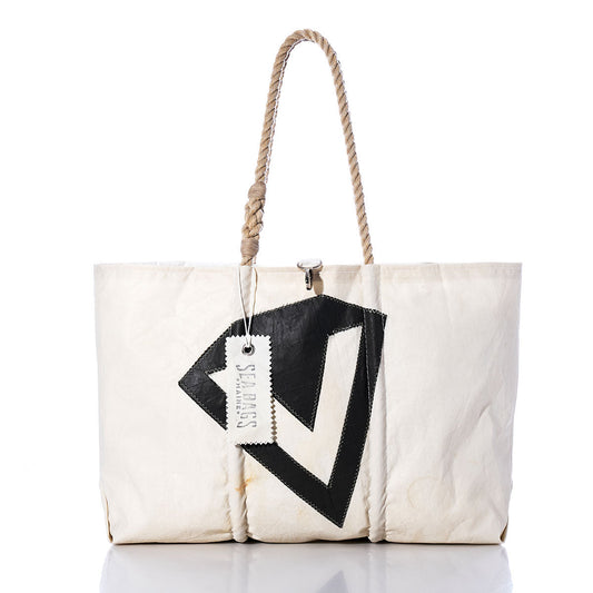 Handcrafted and inspired by nautical style, the Sea Bags Vintage Diamond V Large Tote is a white sailcloth bag featuring rope handles, a bold black geometric design on the front, and a SEA BAGS tag attached to one handle. by Sea Bags
