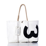 The Sea Bags Vintage 353 Large Tote is a white sail bag with hand-spliced rope handles, accented by a bold black partial number print and finished with an authentic Sea Bags Maine label—a timeless example of Maine craftsmanship. by Sea Bags