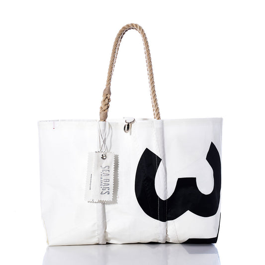 The Sea Bags Vintage 353 Large Tote is a white sail bag with hand-spliced rope handles, accented by a bold black partial number print and finished with an authentic Sea Bags Maine label—a timeless example of Maine craftsmanship. by Sea Bags