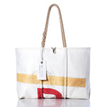 The Sea Bags Vintage Day Sailer Large Tote, handmade in Maine from durable sailcloth, features rope handles, yellow and red accents, and a signature Sea Bags tag. It is shown against a white background. by Sea Bags