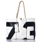 The Sea Bags Vintage 73 Large Tote, crafted in Maine from vintage sail cloth, features black 73 artwork, hand-spliced rope handles, and a signature Sea Bags tag. It is shown on a white background. by Sea Bags