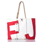 The Sea Bags Vintage FJ Large Tote features a white body with bold red lettering, hand-spliced rope handles, and a white tag labeled Sea Bags. The tote is shown standing upright against a white background. by Sea Bags