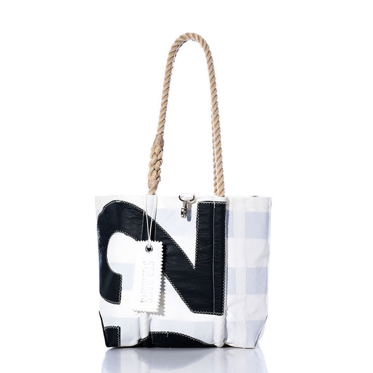 Sea Bags Vintage 162 Handbag featuring a white and black sail insignia, sturdy hemp rope handles, and a visible stitched patch design, photographed on a white background. by Sea Bags