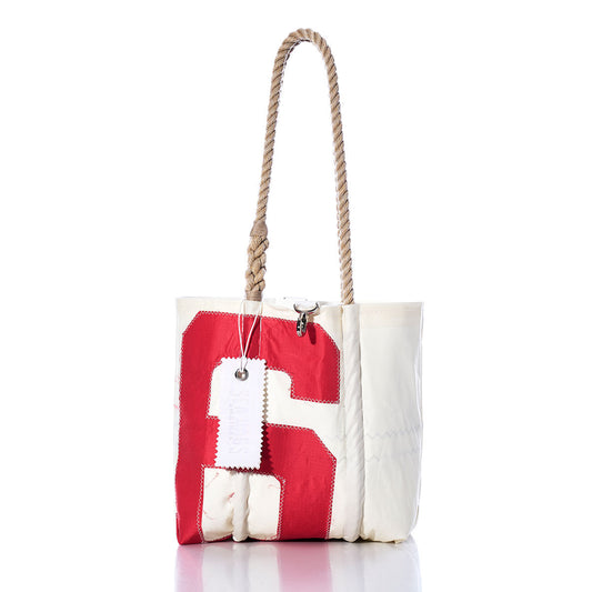 Sea Bags Vintage Red 6 Handbag featuring hemp rope handles, a large red and white sail insignia applique on the front, and a white tag near the top. by Sea Bags