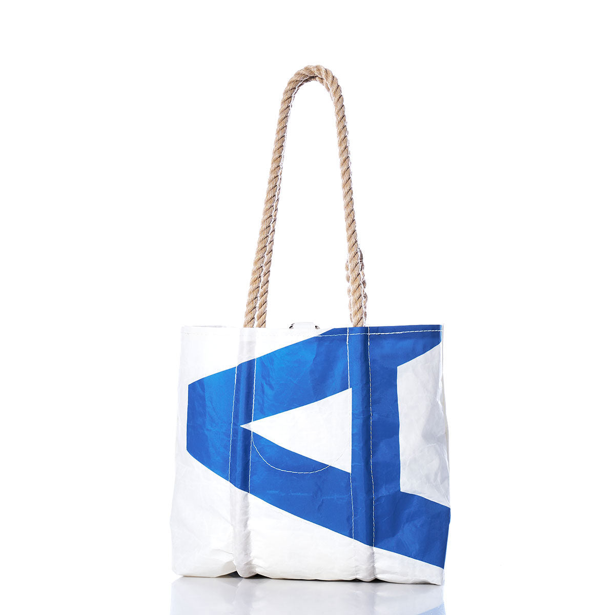 Sea Bags Vintage Blue CA Handbag, crafted from recycled sailcloth with sturdy hemp rope handles and featuring sail insignias in white and blue, is displayed against a plain white background. by Sea Bags