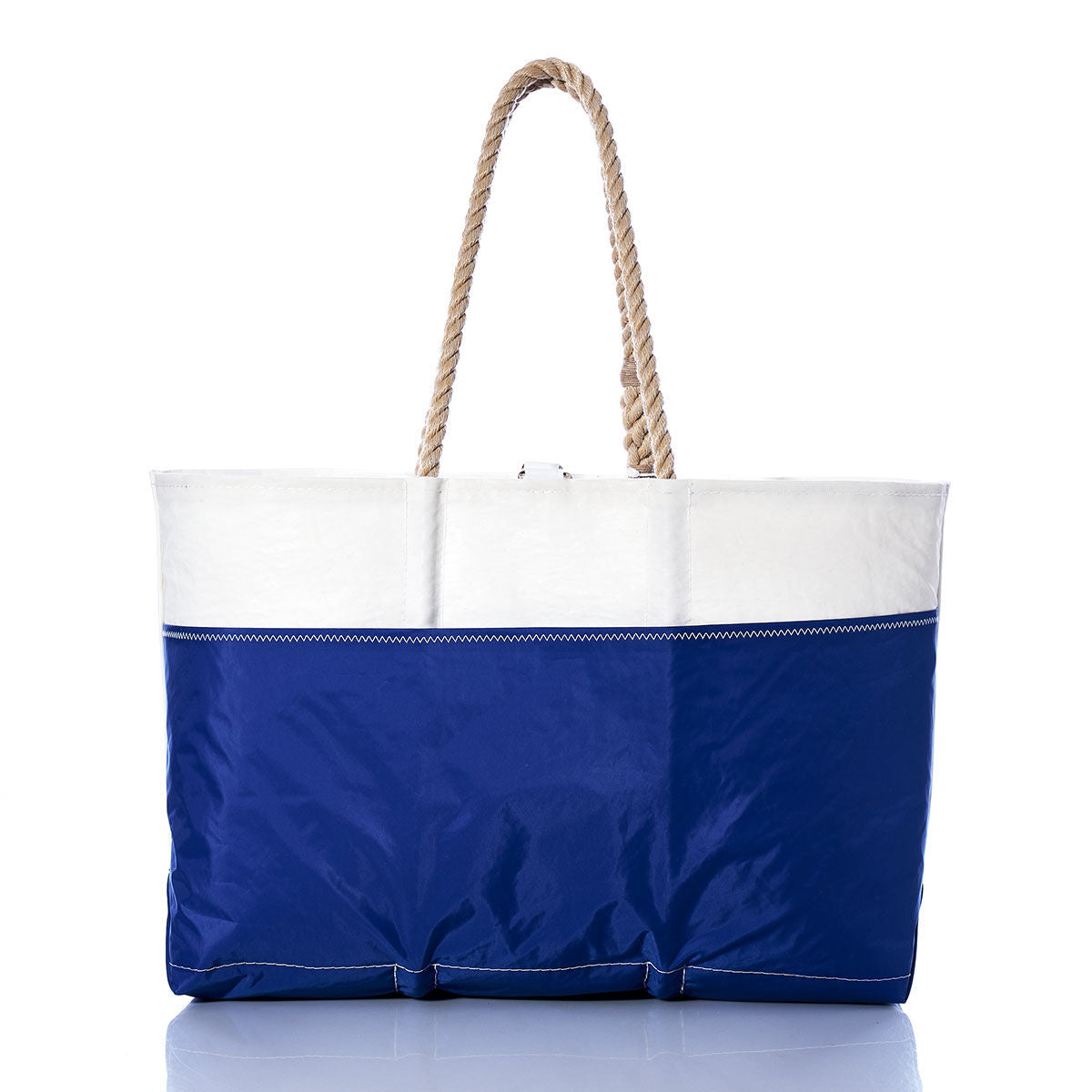 The Sea Bags Vintage Pearson 10M Ogunquit Beach Tote is a large blue and white beach bag crafted from recycled sail cloth, featuring sturdy rope handles and displayed upright against a white background. by Sea Bags