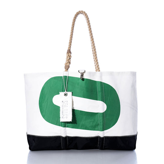 The Sea Bags Vintage Green 0 Ogunquit Beach Tote features a white and black design with a green geometric pattern, sturdy rope handles, and a white tag on the front. Crafted from recycled sail cloth, this tote offers durable, eco-friendly style. by Sea Bags