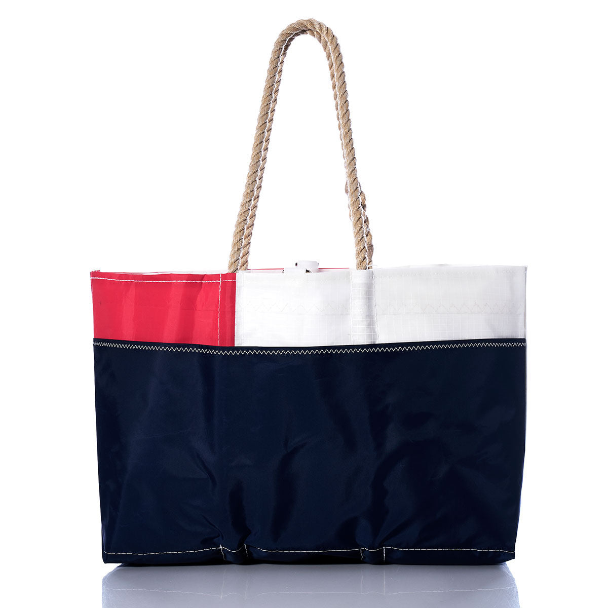 The Sea Bags Vintage Red 4 Ogunquit Beach Tote is crafted from recycled sail cloth and showcases bold red, white, and navy color blocks with sturdy rope handles, set against a white background. by Sea Bags