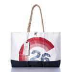 Sea Bags Vintage Colgate 26 Ogunquit Beach Tote in white and navy, made from recycled sail cloth with sturdy rope handles and adorned with a bold red and gray “26” graphic inspired by the Vintage Colgate 26, finished with a Sea Bags label. by Sea Bags