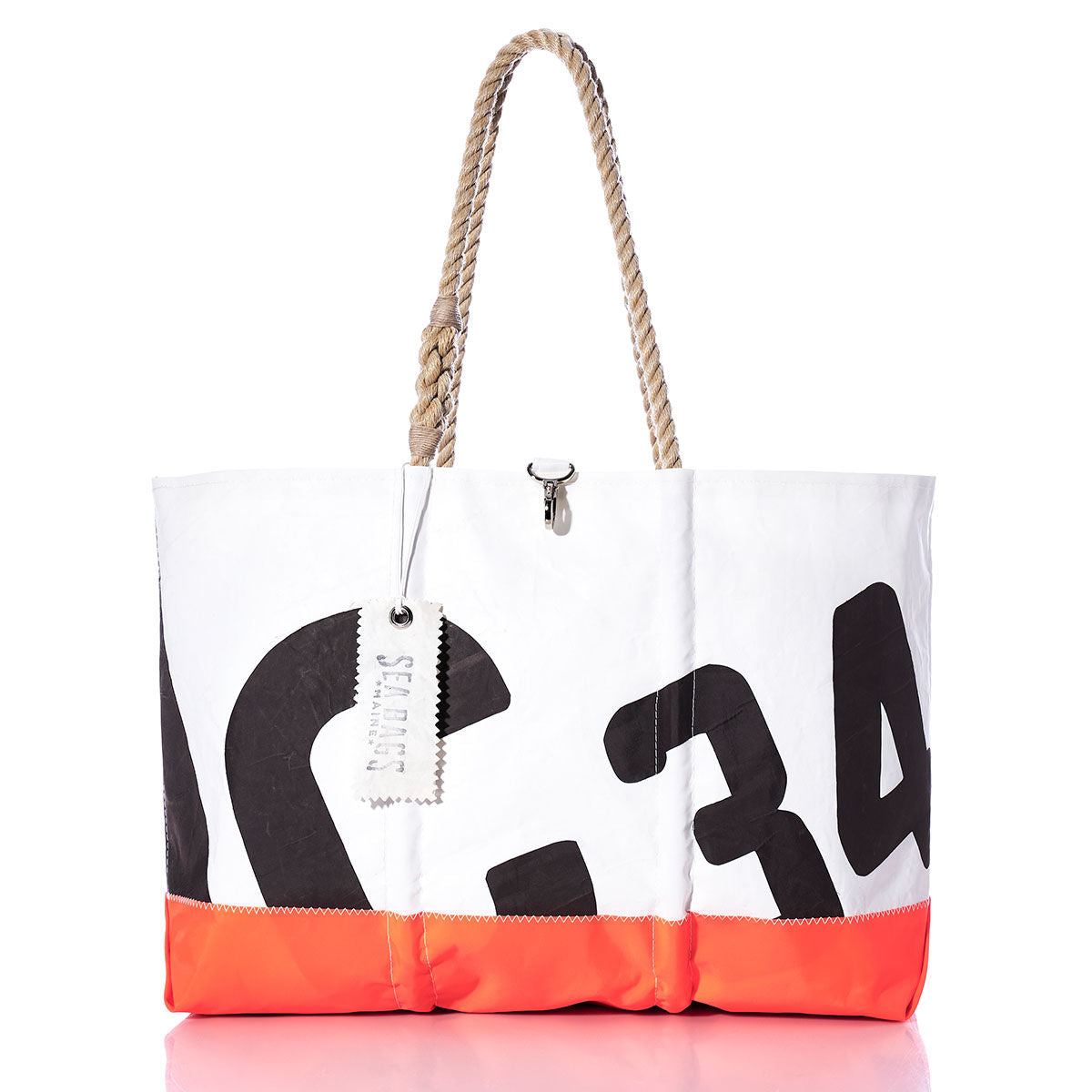 Introducing the Vintage Crealock 34 Ogunquit Beach Tote by Sea Bags—a white and orange tote made from recycled sail cloth, adorned with bold black numbers, sturdy rope handles, and a signature SEA BAGS tag—a distinctive accessory inspired by the iconic Crealock 34. by Sea Bags