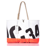 Introducing the Vintage Crealock 34 Ogunquit Beach Tote by Sea Bags—a white and orange tote made from recycled sail cloth, adorned with bold black numbers, sturdy rope handles, and a signature SEA BAGS tag—a distinctive accessory inspired by the iconic Crealock 34. by Sea Bags
