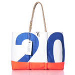 The Sea Bags Vintage Blue 20 Ogunquit Beach Tote features sturdy rope handles and is crafted from recycled sail cloth in white, blue, and orange. This spacious tote displays the number 20 and includes a signature Sea Bags tag. by Sea Bags