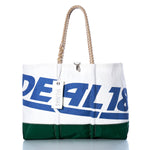 The Vintage Ideal 18 Ogunquit Beach Tote by Sea Bags features white and green recycled sail cloth panels, sturdy rope handles, bold blue and white graphic text, and a signature hanging SEA BAGS tag—offering the perfect blend of vintage beach bag style and coastal charm. by Sea Bags