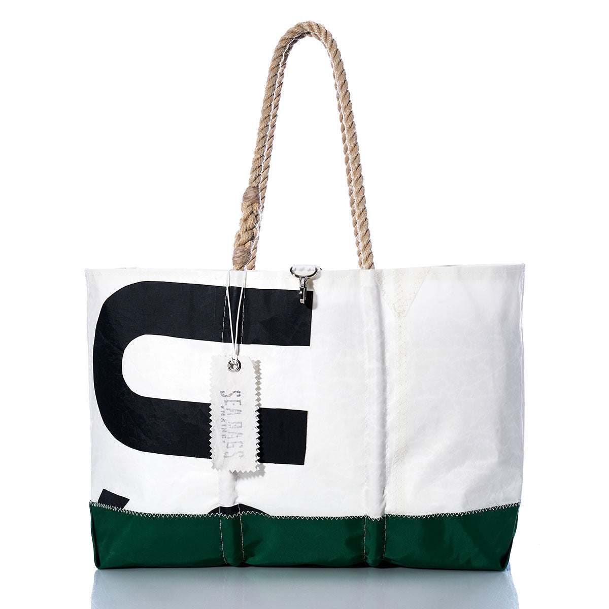 Vintage US-8 Ogunquit Beach Tote by Sea Bags, made from recycled sail cloth in white and green, features black lettering, rope handles, and a white SEABAGS tag, displayed on a white background. by Sea Bags