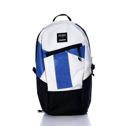 The Vintage Blue and White Crew Backpack by Sea Bags is crafted from recycled sail cloth, featuring a front zipper pocket, a top handle, and a visible Sea Bags label on the upper front—a stylish and sustainable choice. by Sea Bags