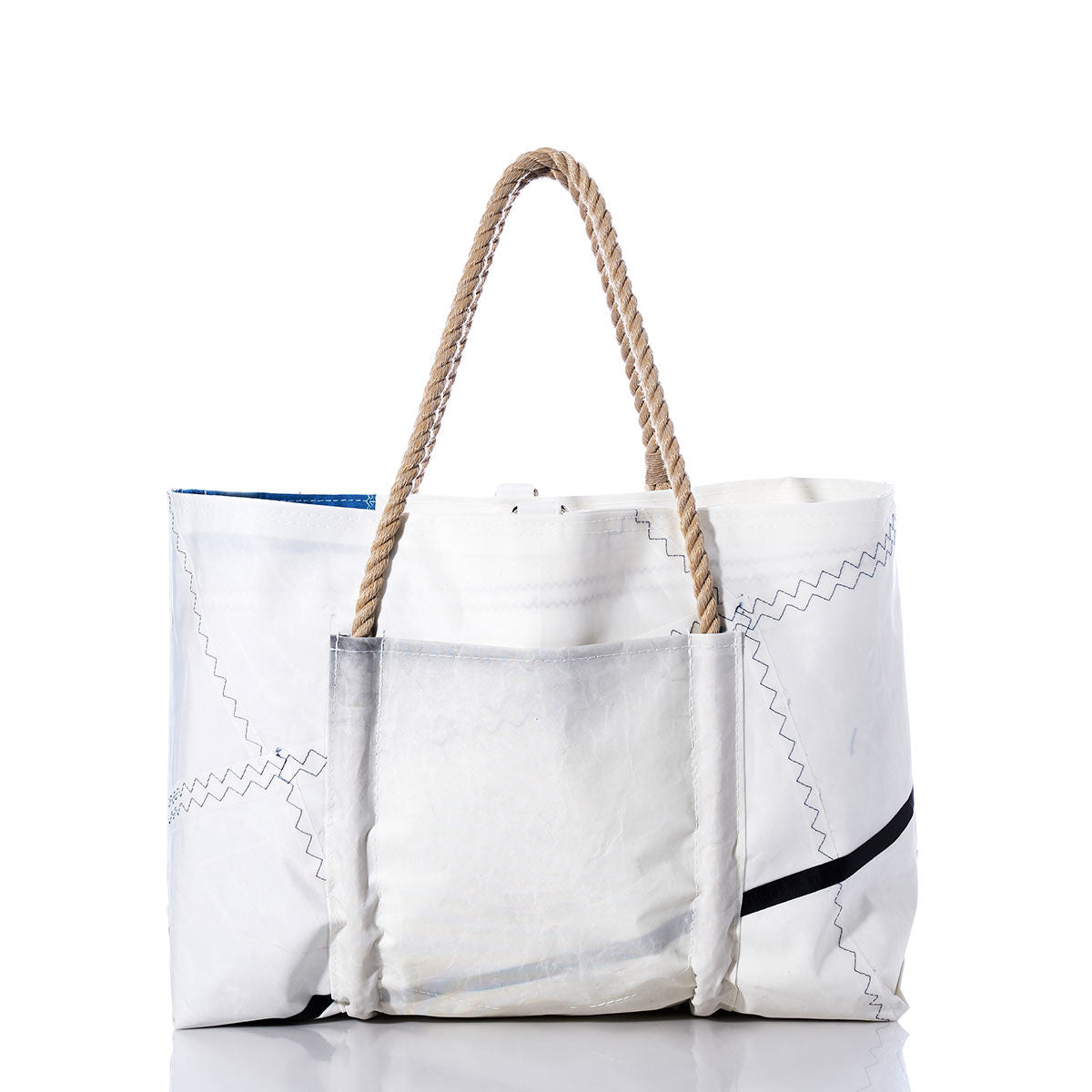 The Vintage Black and White Wharf Tote by Sea Bags features zigzag stitching, rope handles, and a front pocket. Handcrafted from recycled sail cloth in true Portland, Maine tote style, it is photographed against a white background. by Sea Bags