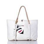 Expertly handcrafted in Portland, Maine from recycled sail cloth, the Sea Bags Vintage Evolution Wharf Tote features a white design with rope handles, a front pocket, and a bold black, red, and white EVOLUTION graphic. A SEABAGS tag is attached to the handle. by Sea Bags