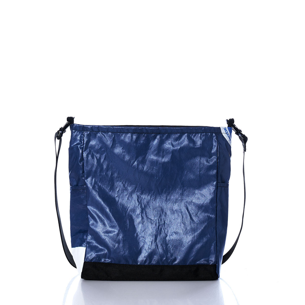 The Sea Bags Vintage White S Medium Voyager Crew Crossbody is a shoulder bag crafted from recycled polyester, featuring crinkled white fabric with black adjustable straps and a black base, displayed against a white background. by Sea Bags