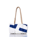 Sea Bags Vintage Blue and White Baguette Bag featuring a thick, hand-spliced hemp rope handle is photographed against a white background. by Sea Bags