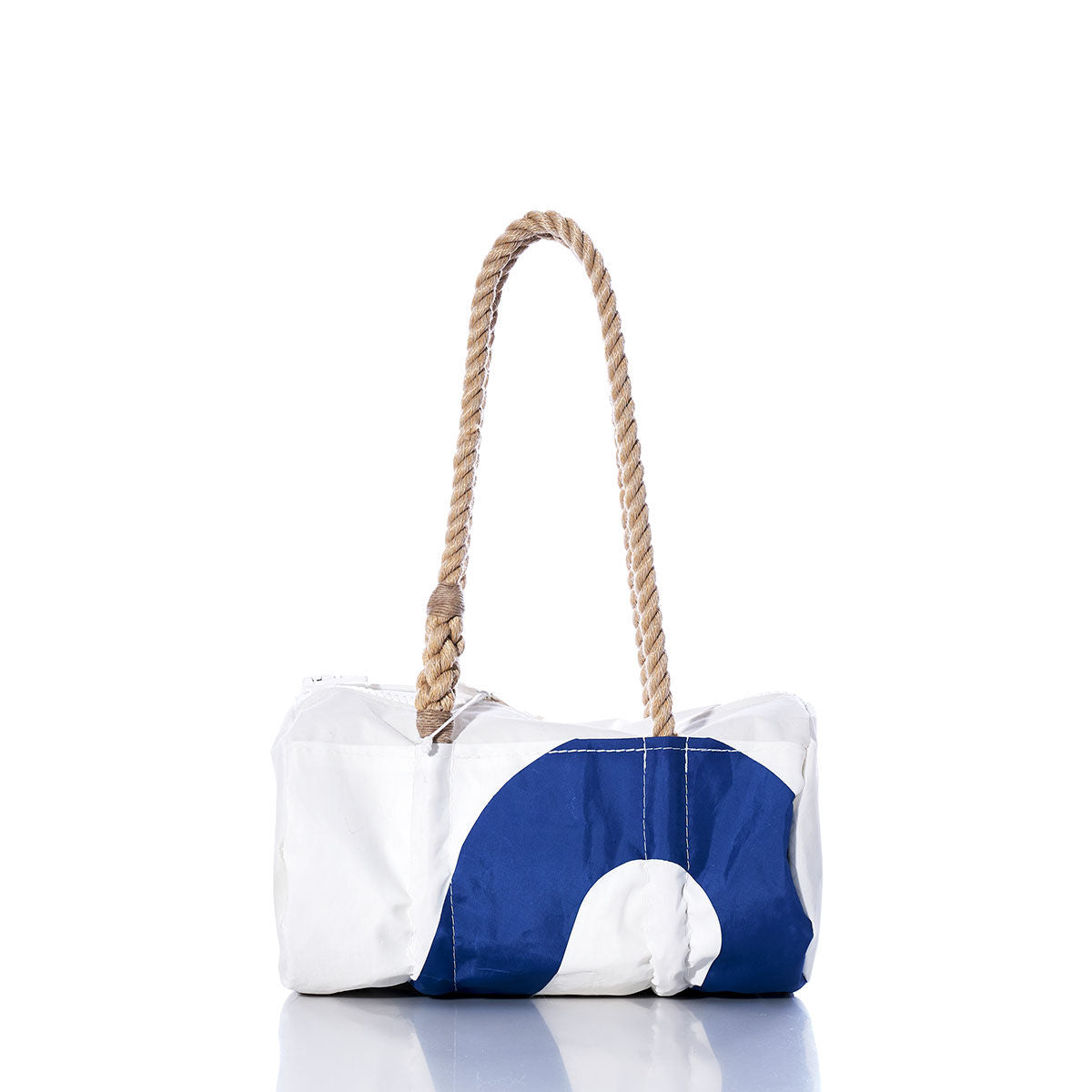 The Sea Bags Vintage Blue 0 Baguette Bag features a white and blue rectangular design with a prominent blue semicircle, distinctive sail insignias, sturdy hemp rope handles, and visible stitching, all showcased against a white background. by Sea Bags