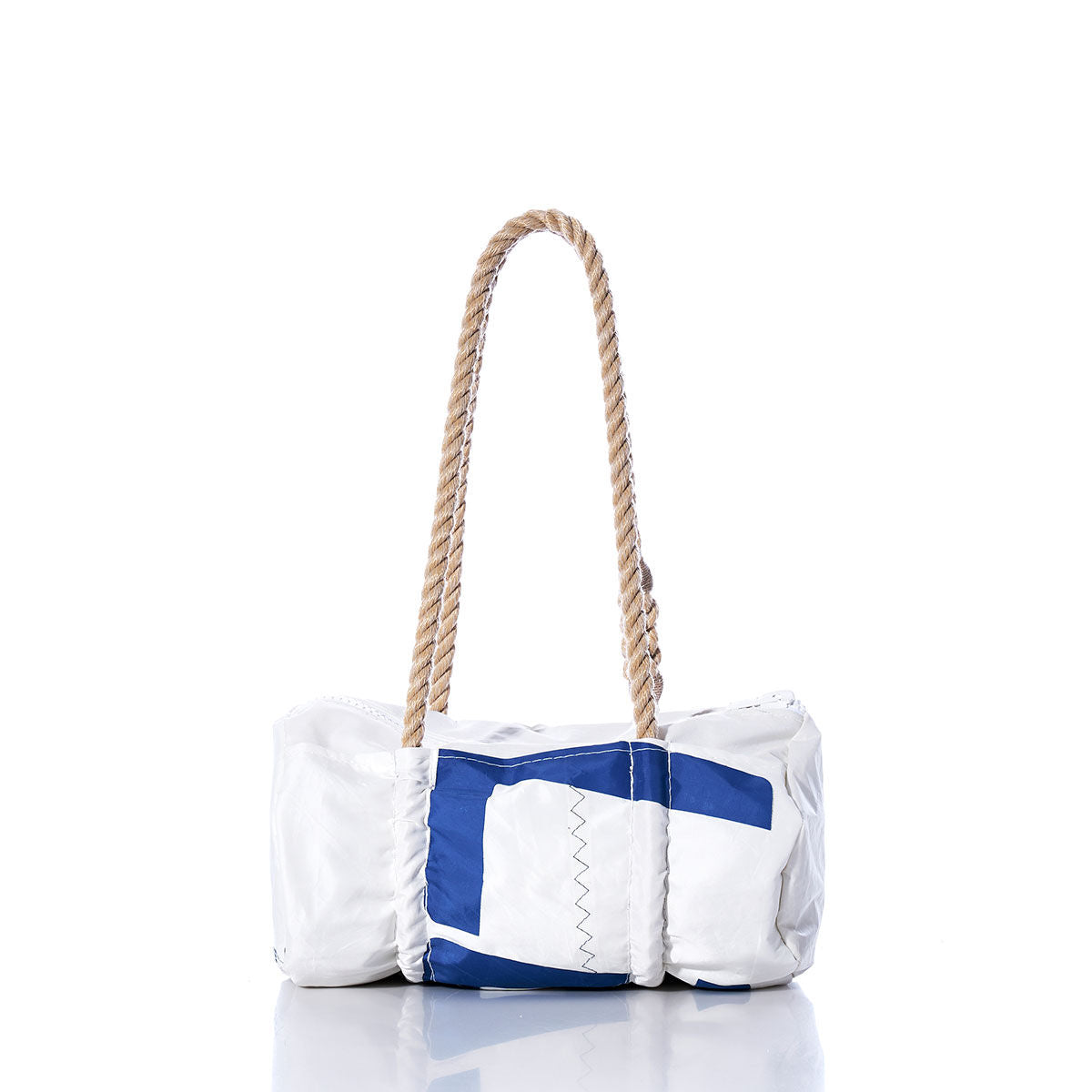The Sea Bags Vintage 527 Baguette Bag is a white and blue rectangular tote featuring subtle sail insignias and a thick, hand-spliced hemp rope handle, displayed on a white background. by Sea Bags