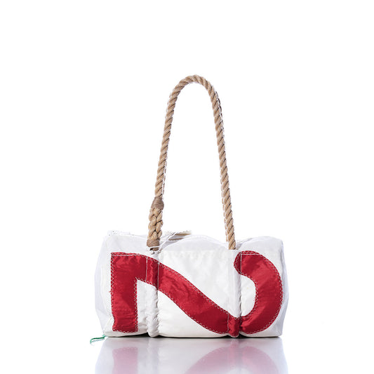 The Sea Bags Vintage Red 24 Baguette Bag is pictured on a white background, featuring a hand-spliced hemp rope handle and a bold red sail insignia design on the front. by Sea Bags