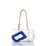 The Sea Bags Vintage 420 Baguette Bag, crafted from white and blue vintage sails with hand-spliced hemp rope handles, is shown on a white background. by Sea Bags