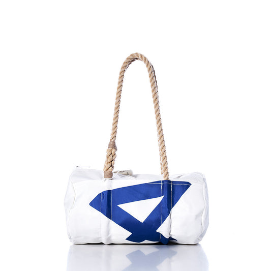 The Sea Bags Vintage 420 Baguette Bag is a white cylindrical sail insignia bag with a blue geometric design, featuring thick hand-spliced hemp rope handles, photographed on a white background. by Sea Bags