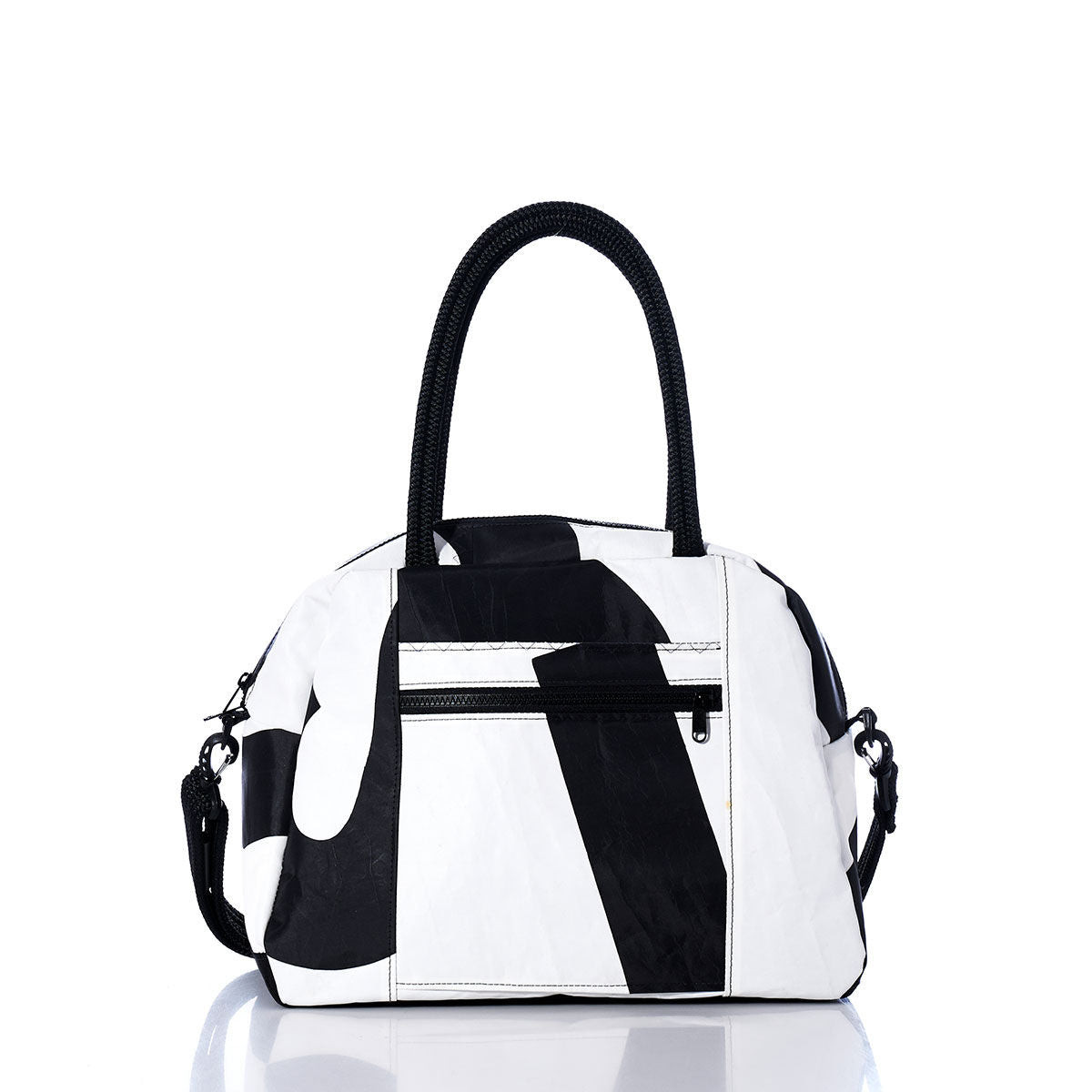 The Sea Bags Vintage Black and White Essential Weekender Travel Bag features an abstract white and black design with black handles and a front zippered pocket, shown against a white background—perfect for overnight trips or as a stylish weekender travel bag. by Sea Bags