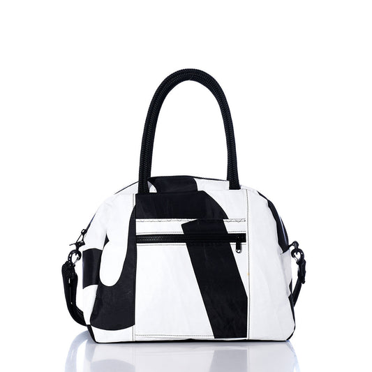 The Sea Bags Vintage Black and White Essential Weekender Travel Bag features an abstract white and black design with black handles and a front zippered pocket, shown against a white background—perfect for overnight trips or as a stylish weekender travel bag. by Sea Bags