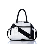 The Sea Bags Vintage Black and White Essential Weekender Travel Bag is showcased against a white background, featuring a bold geometric pattern, dual handles, a detachable shoulder strap, and a convenient trolley sleeve for effortless travel. by Sea Bags