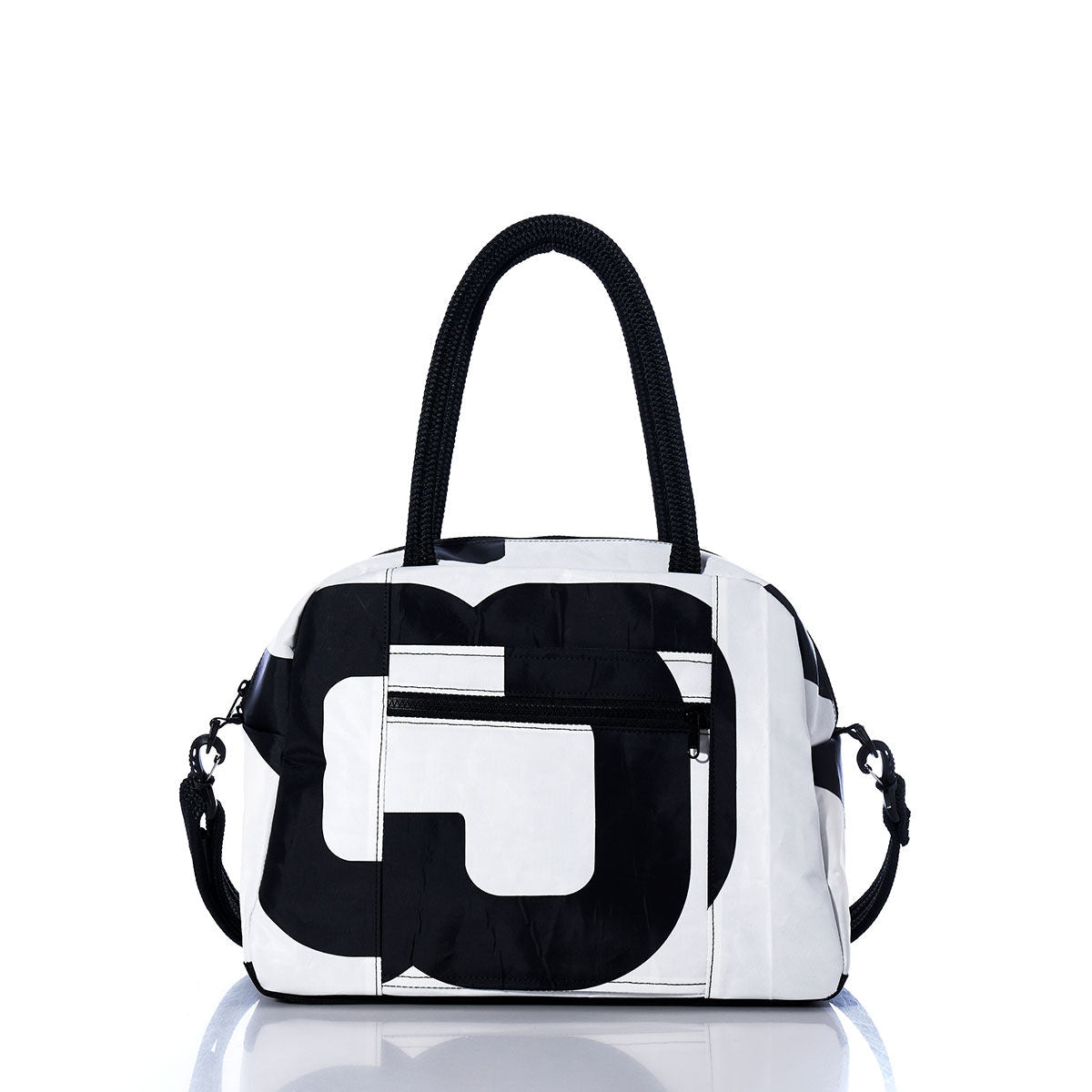 Sea Bags Vintage Black and White Essential Weekender Travel Bag features a striking geometric pattern in classic black and white, dual handles, a front zip pocket, and a detachable shoulder strap—making it the perfect carryon for your next getaway. A convenient trolley sleeve ensures easy transport. The bag is displayed against a white background. by Sea Bags