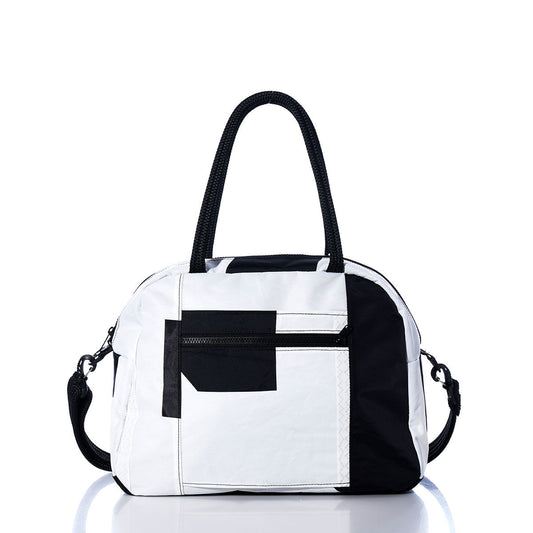 The Sea Bags Vintage Black 7 Essential Weekender Travel Bag, featuring a classic black and white design, front zipper pocket, two sturdy handles, and a detachable shoulder strap, is photographed against a white background. by Sea Bags