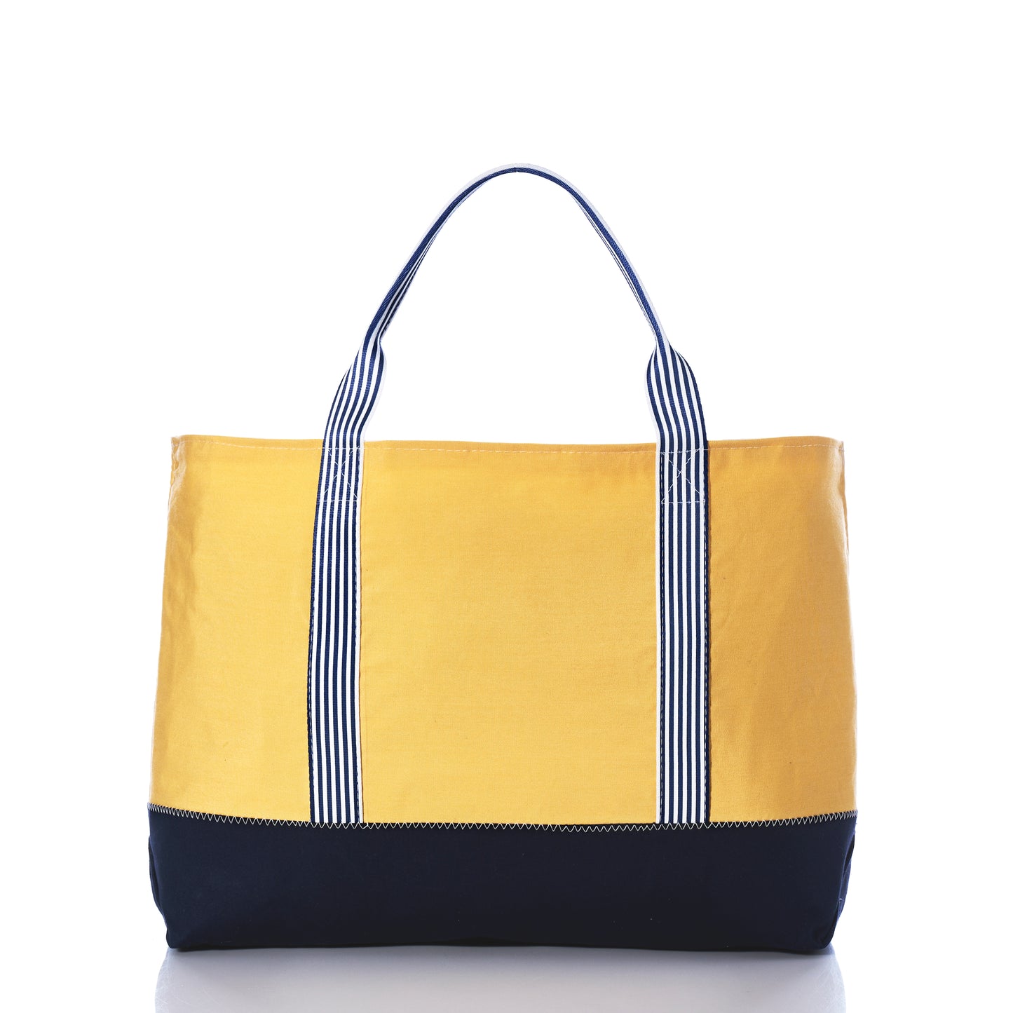 Introducing the Sea Bags Vintage Yellow Canvas Large Tote from their Heritage Collection, this limited edition bag features a striking yellow canvas design complemented by a black bottom and black-and-white striped handles, beautifully showcased on a white background. by Sea Bags