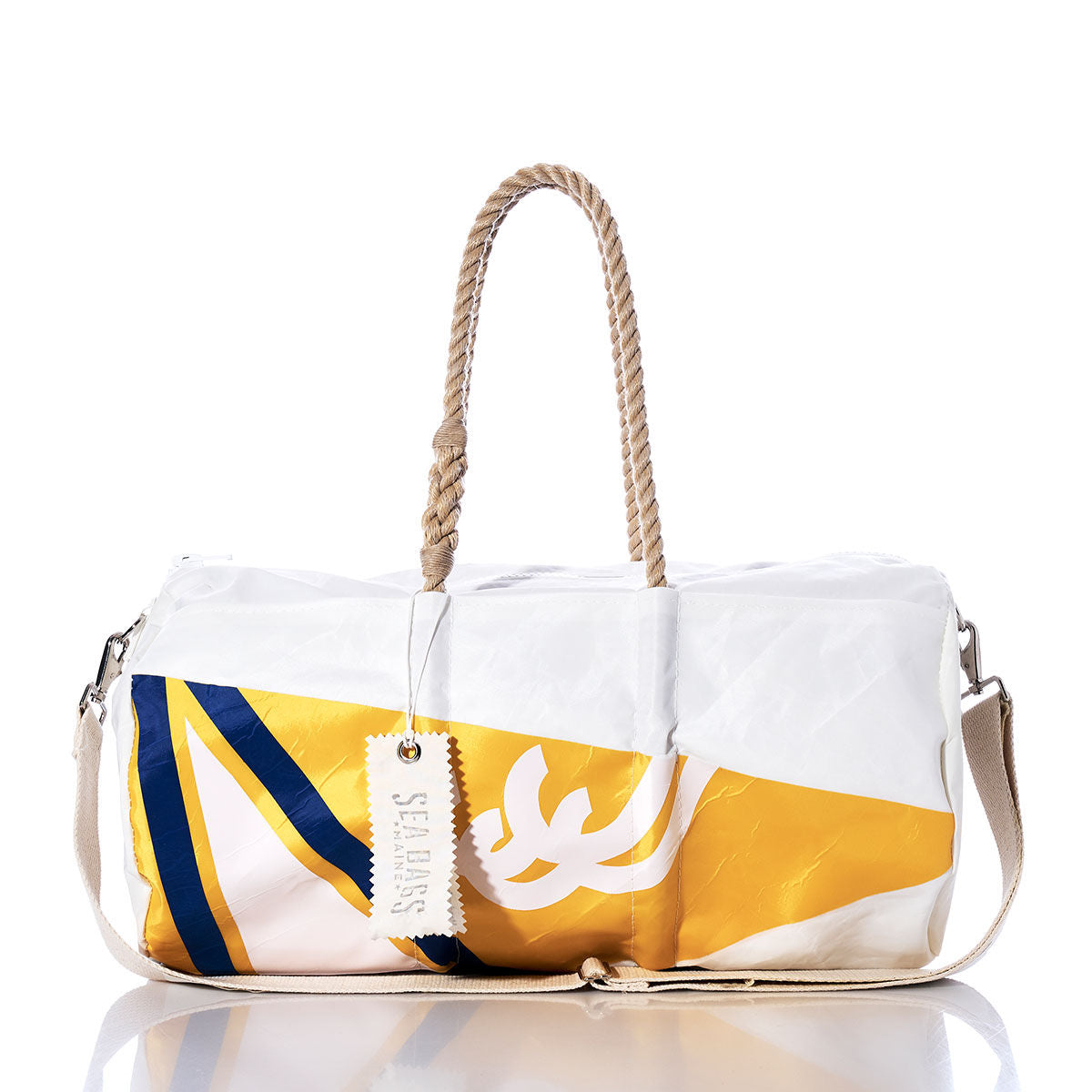 The Vintage Yellow Burgee Duffel from Sea Bags is a white duffel bag made from recycled sail cloth with a yellow and blue design, featuring hemp rope handles, a beige shoulder strap, and a visible Sea Bags tag, shown against a white background. by Sea Bags