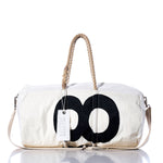 Vintage S8 Duffel by Sea Bags, crafted from recycled sail cloth with black circular sail insignias, features rope handles, a tan shoulder strap, and a visible SEA BAGS tag; displayed against a white background. by Sea Bags