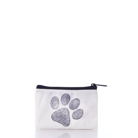 The Sea Bags Paw Print Everyday Carry Mini Pouch is a small white zippered coin purse crafted from recycled sail cloth, adorned with a black paw print design on the front and photographed against a plain white background. by Sea Bags