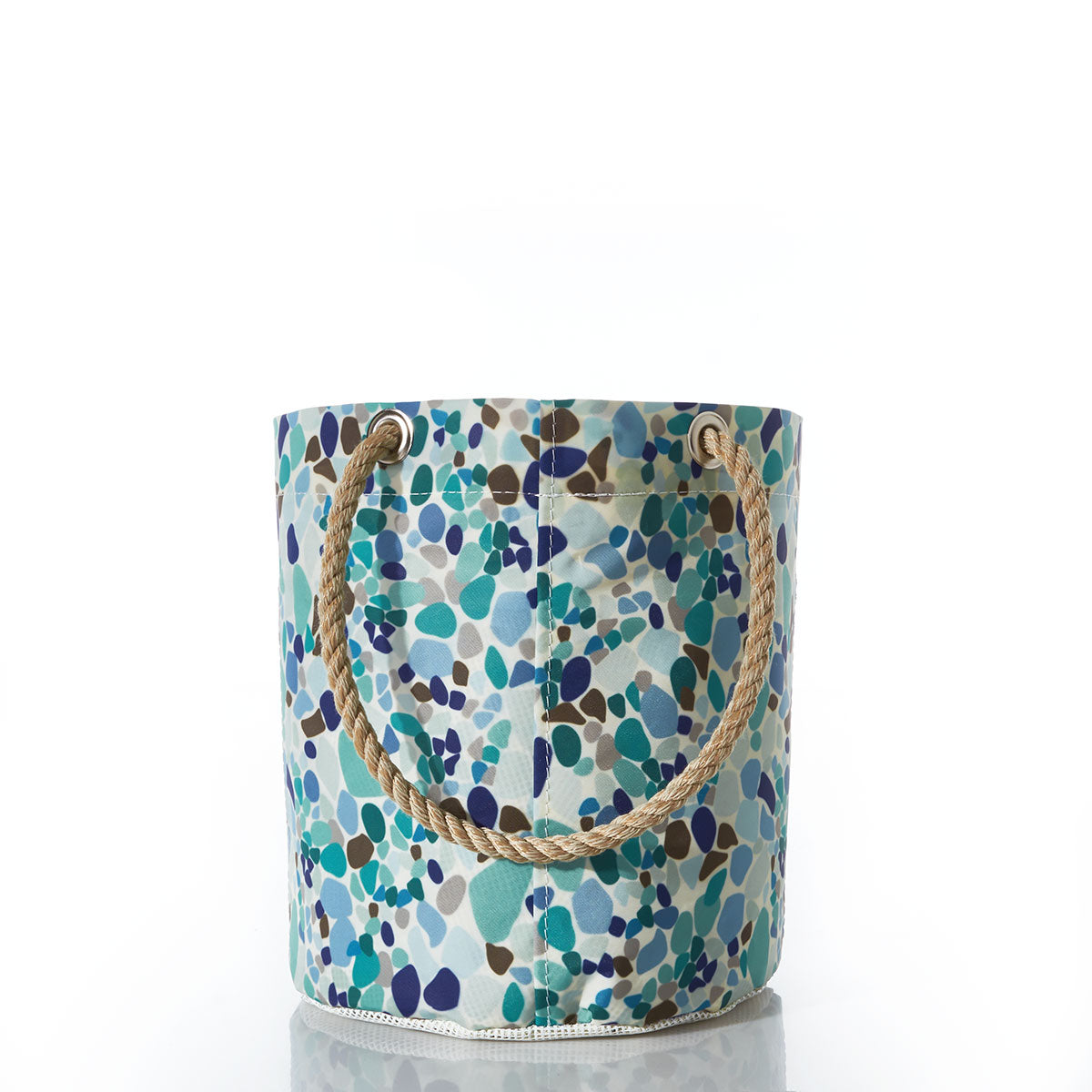 Sea Bags Sea Glass Print Beachcomber Bucket Bag, crafted from recycled sail cloth with a blue, teal, and green pebble pattern reminiscent of sea glass, features two twisted rope handles and is shown on a white background. by Sea Bags