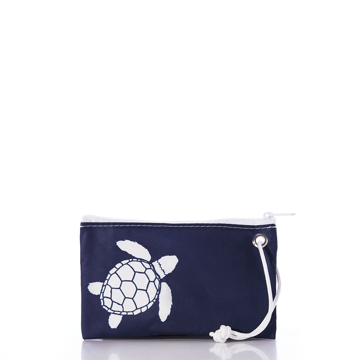 The White-on-Navy Sea Turtle Wristlet by Sea Bags is a small navy zippered pouch featuring a white sea turtle graphic and a white cord loop for easy carrying, crafted from recycled sails for an eco-friendly accessory perfect for hands-free use. by Sea Bags