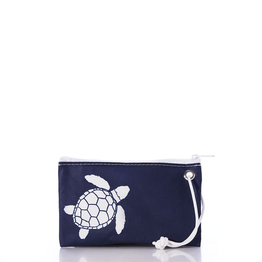 The White-on-Navy Sea Turtle Wristlet by Sea Bags is a small navy zippered pouch featuring a white sea turtle graphic and a white cord loop for easy carrying, crafted from recycled sails for an eco-friendly accessory perfect for hands-free use. by Sea Bags