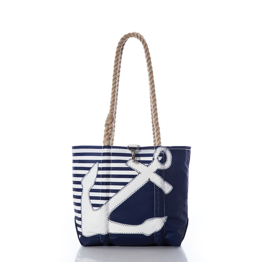 Sea Bags Breton Stripe White Anchor Handbag, handcrafted in Maine from recycled sail cloth, features navy blue and white stripes with a bold white anchor design and rope handles, displayed against a white background. by Sea Bags