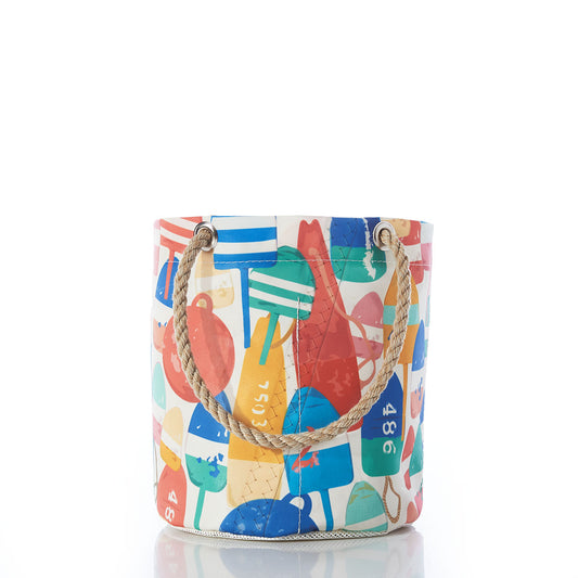 Sea Bags Downeast Buoys Beachcomber Bucket—a vibrant patterned bucket bag with rope handles, inspired by recycled sail cloth—displayed against a white background. by Sea Bags