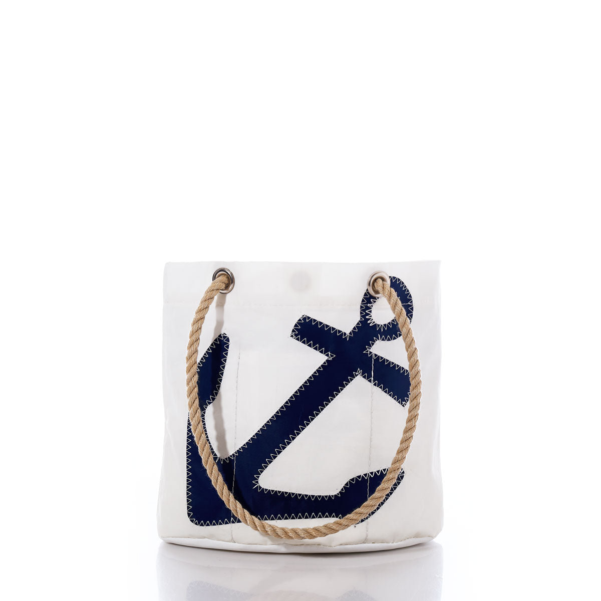 The Sea Bags Navy Anchor Essential Handbag is a white tote featuring a navy blue anchor design and tan rope handles, expertly crafted from recycled sail cloth for a stylish and sustainable accessory. Shown against a plain white background. by Sea Bags