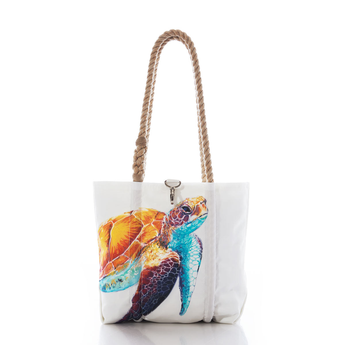 The Multicolor Sea Turtle Handbag by Sea Bags is crafted from recycled sail bags and features rope handles along with a vibrant sea turtle illustration on the front, offering a charming and sustainable accessory, shown against a white background. by Sea Bags