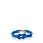Introducing the Square Knot Bracelet - Blue from Lemon  Line, featuring a blue braided nautical design with a central knot and silver-toned metal clasp, showcased against a white background—a perfect summer accessory. by Sea Bags