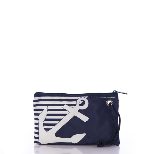 The Sea Bags Breton Stripe White Anchor Wristlet is a small navy pouch featuring a white anchor and striped design, crafted from recycled sail material with a zipper closure and drawstring loop, offering a stylish nautical purse displayed against a white background. by Sea Bags