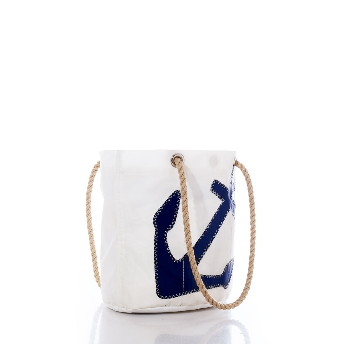 Introducing the Sea Bags Navy Anchor Essential Handbag, a lightweight bucket bag made from recycled sail cloth for an eco-friendly flair. Featuring a navy blue anchor design and rope handles, this stylish handbag beautifully blends nautical charm with practical functionality and is displayed against a clean white background. by Sea Bags