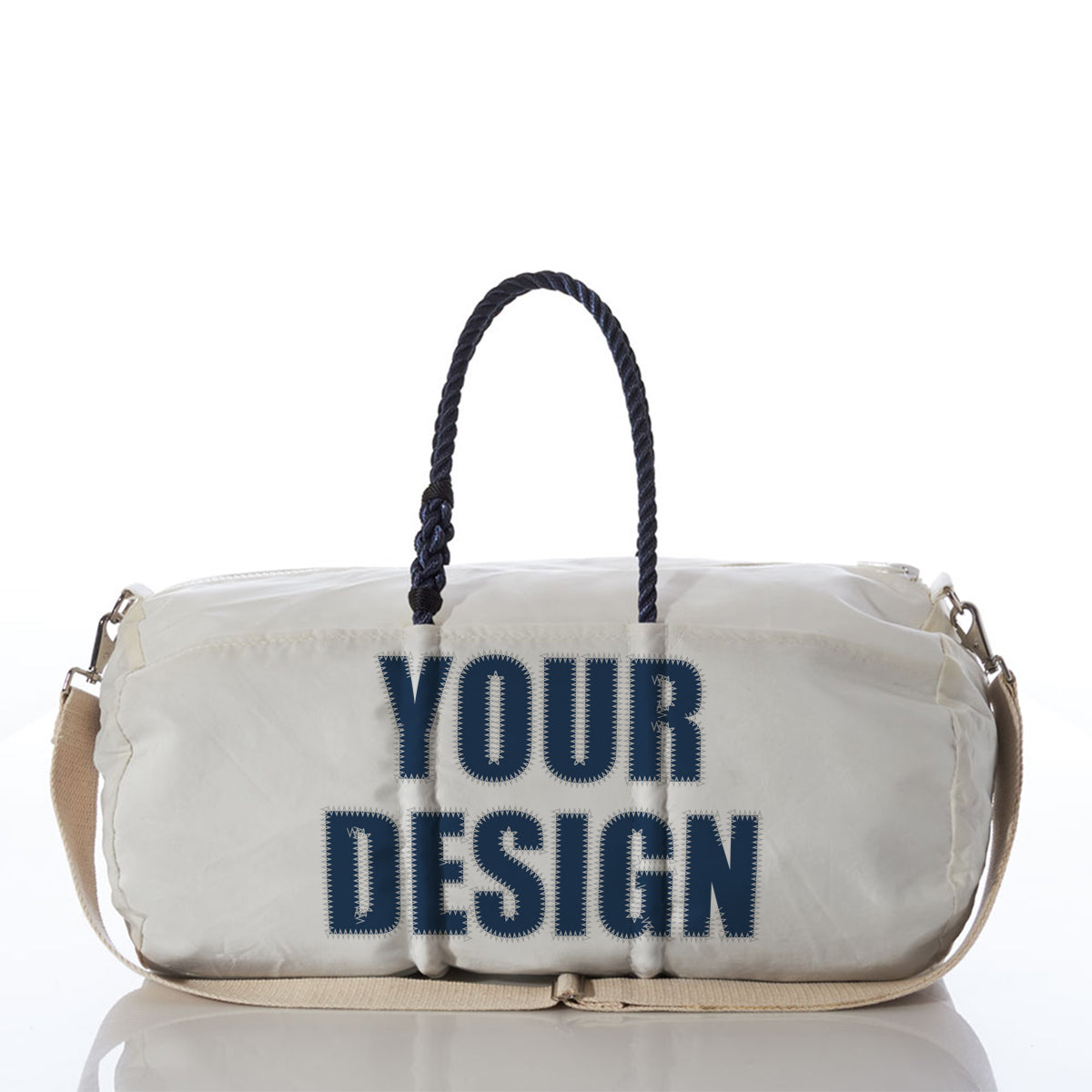 The Sea Bags Custom Design Duffel features a crisp white exterior with striking dark blue rope handles and beige shoulder straps, boldly showcasing YOUR DESIGN on the front—an ideal personalized travel bag for anyone eager to make a statement. by Sea Bags