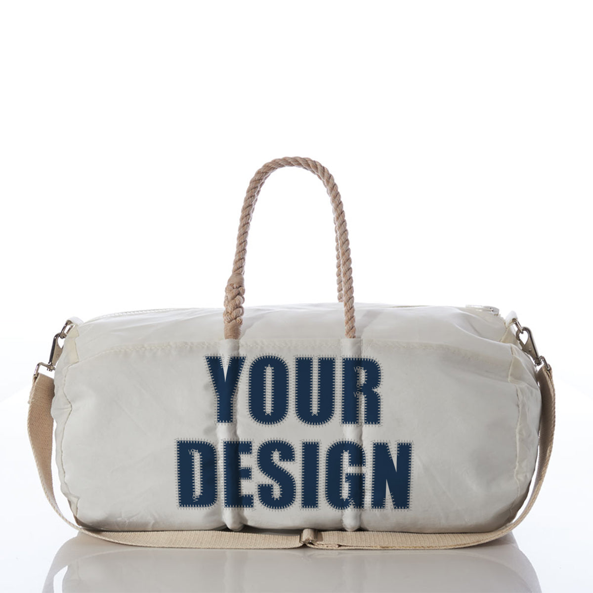 The Sea Bags Custom Design Duffel features a white exterior with beige rope handles, a matching beige shoulder strap, and YOUR DESIGN boldly printed in navy blue on the front—making it the ideal personalized travel bag for weekend trips or a stylish carry-on. by Sea Bags