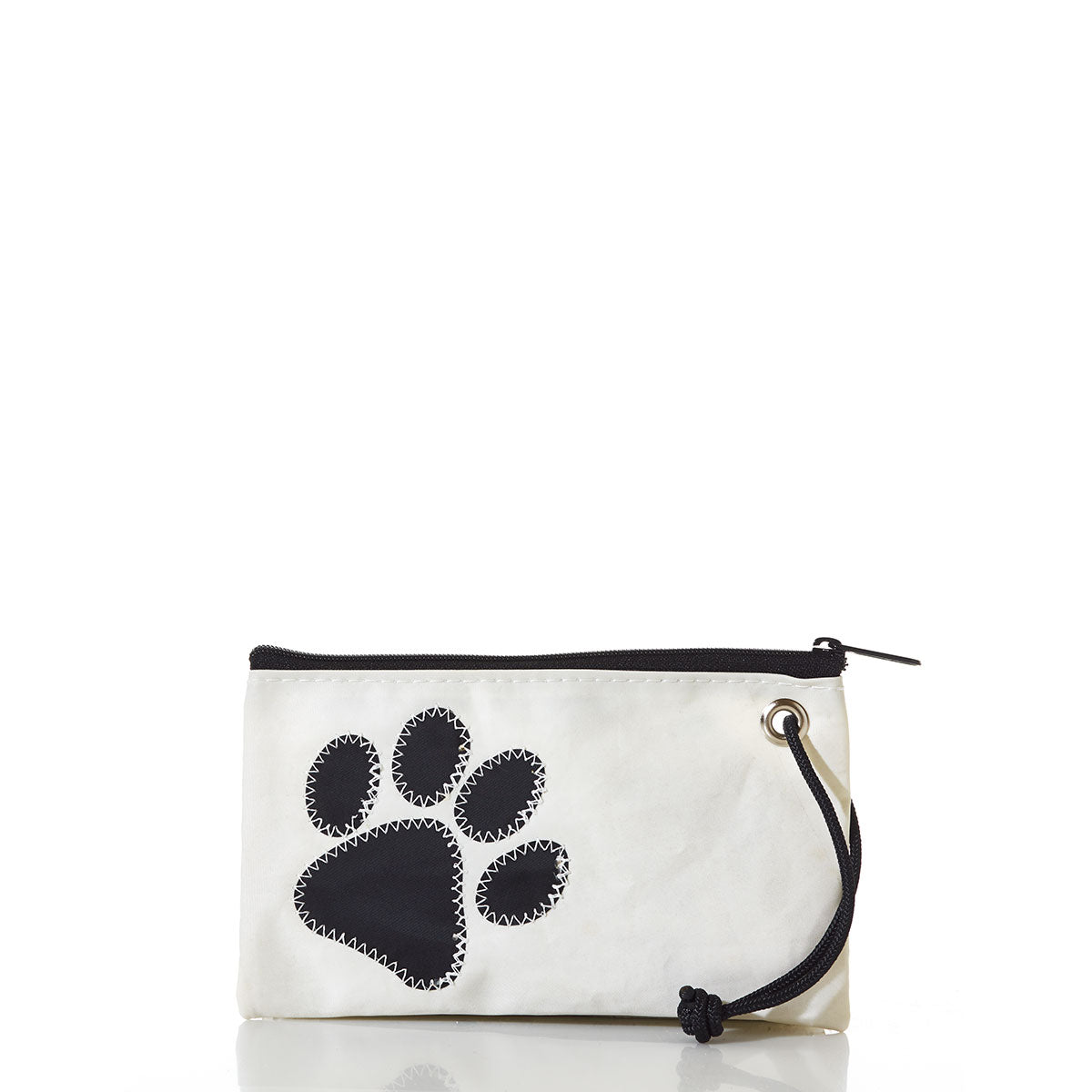 The Sea Bags Paw Print Wristlet is a small white zippered pouch featuring a bold black paw print design, complete with a black cord threaded through a metal grommet in the corner—making it the perfect everyday accessory for any animal lover. by Sea Bags
